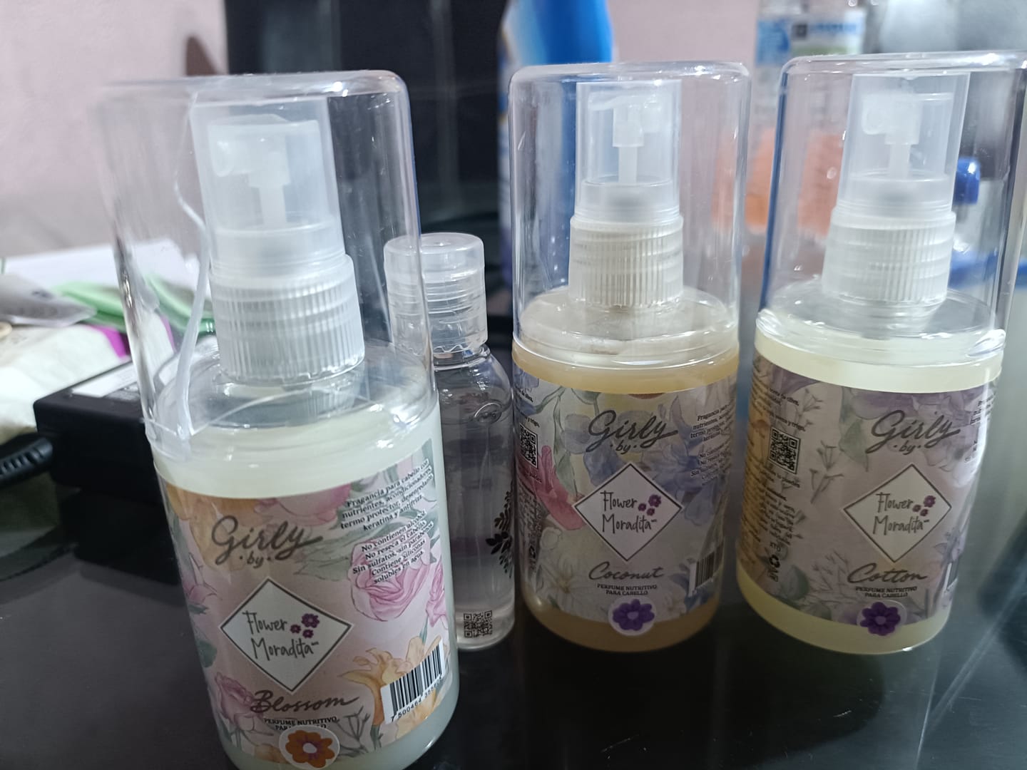 Customer photo review of Kit 3 Perfumes para cabello de 100ml