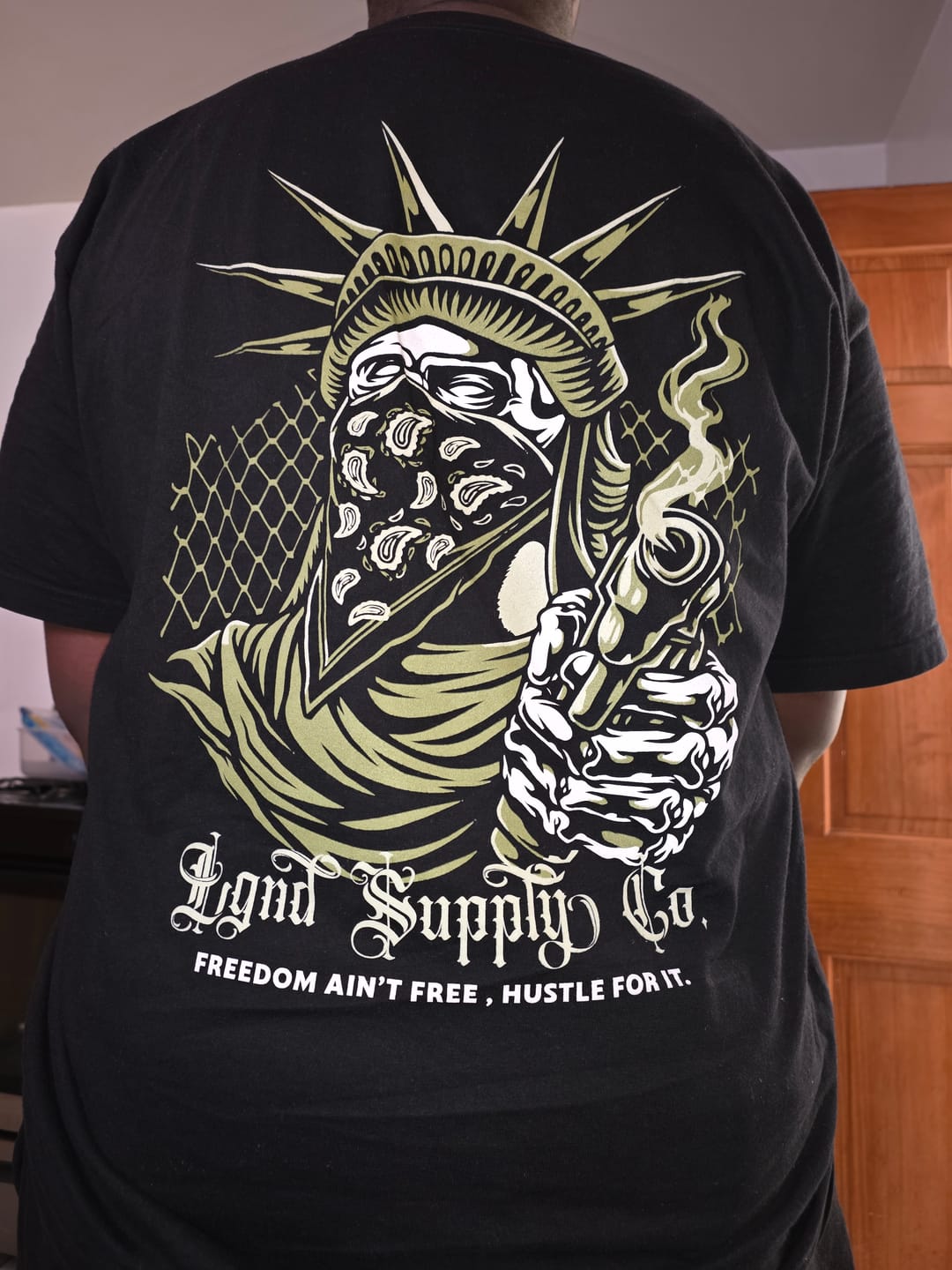 Customer photo review of Fund Yourself Tee