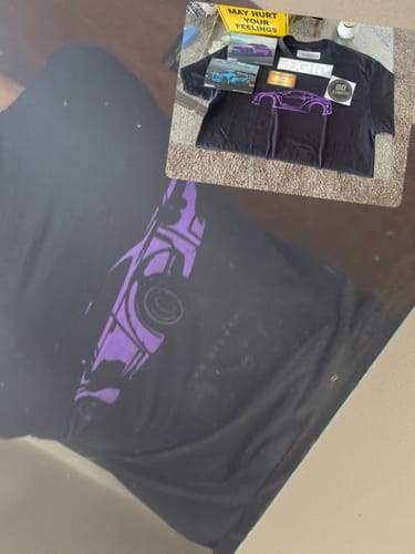 Reviewer's composite photo showing the black DCG88 shirt being worn and also laid out flat.