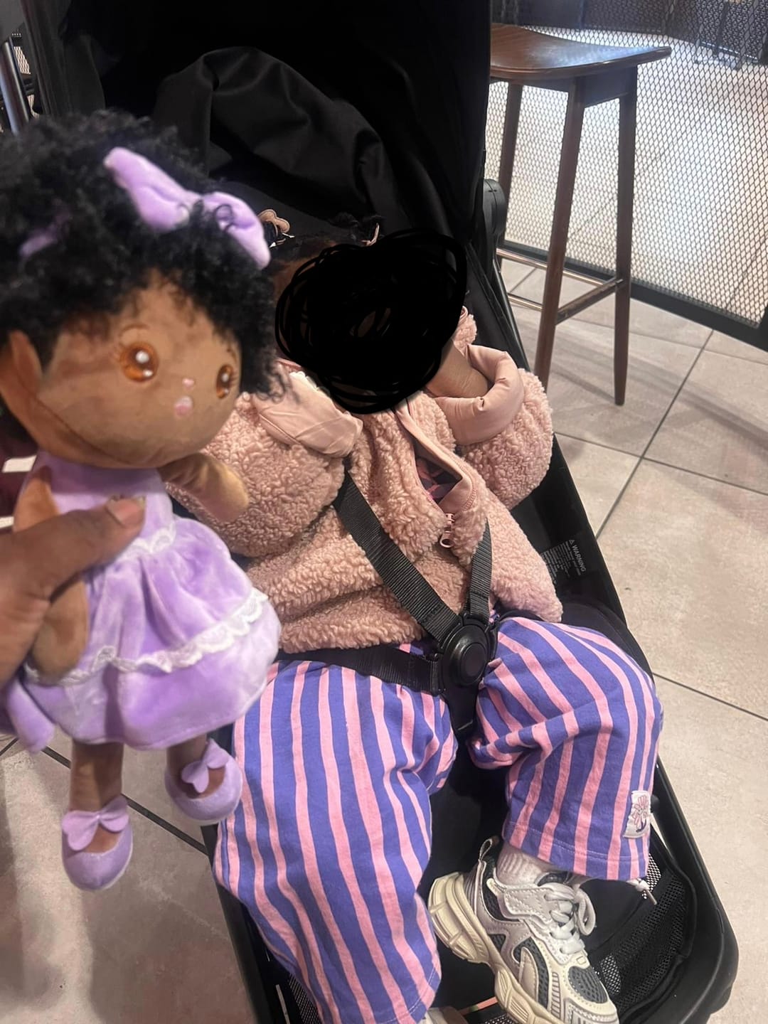 Customer photo review of Personalized Deep Skin Tone Plush Curly Hair Baby Girl Doll