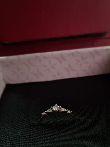 Customer's delicate Silver Stun Ring with sparkling zircons, shown inside its jewelry box.