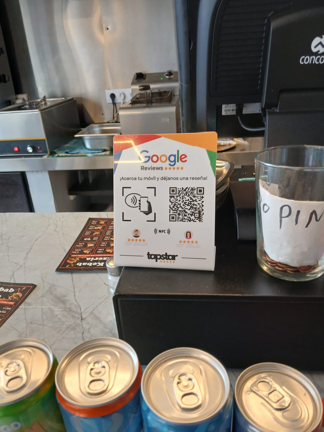 Customer photo review of Expositor Reseñas Google NFC y QR