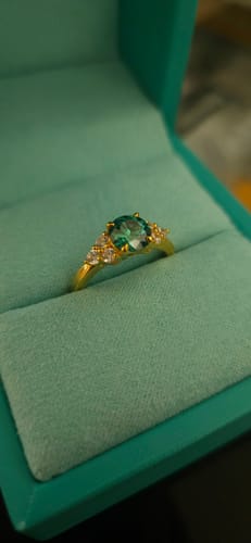 Customer photo review of Green Moissanite Side Stone Engagement Ring