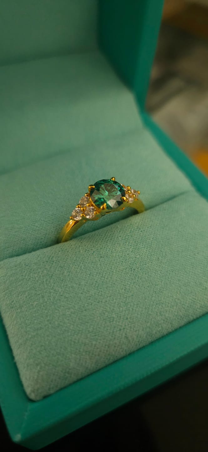 Customer photo review of Green Moissanite Side Stone Engagement Ring