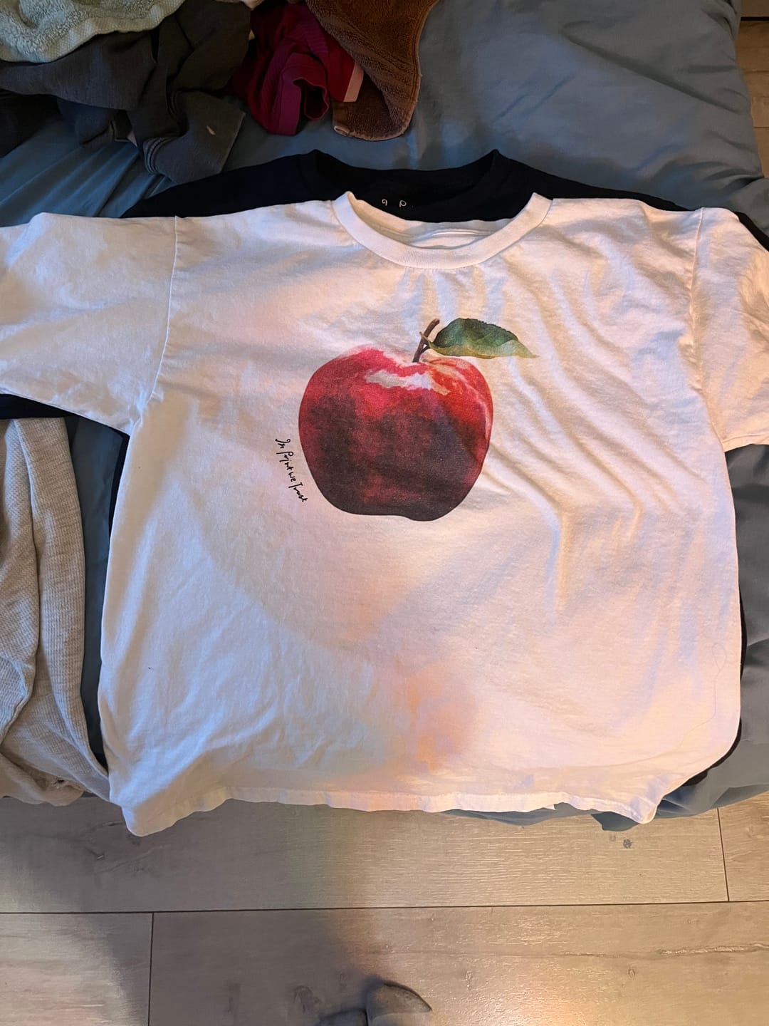 Customer photo review of rotten baby tee