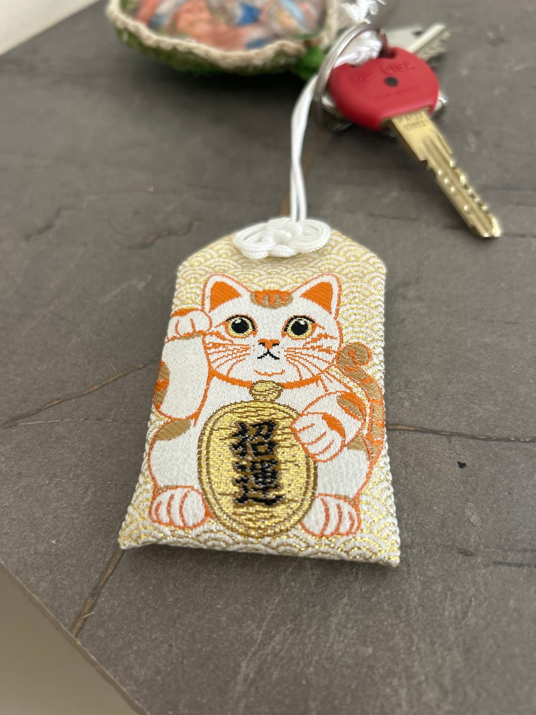 Customer photo review of Omamori Maneki Neko giapponese