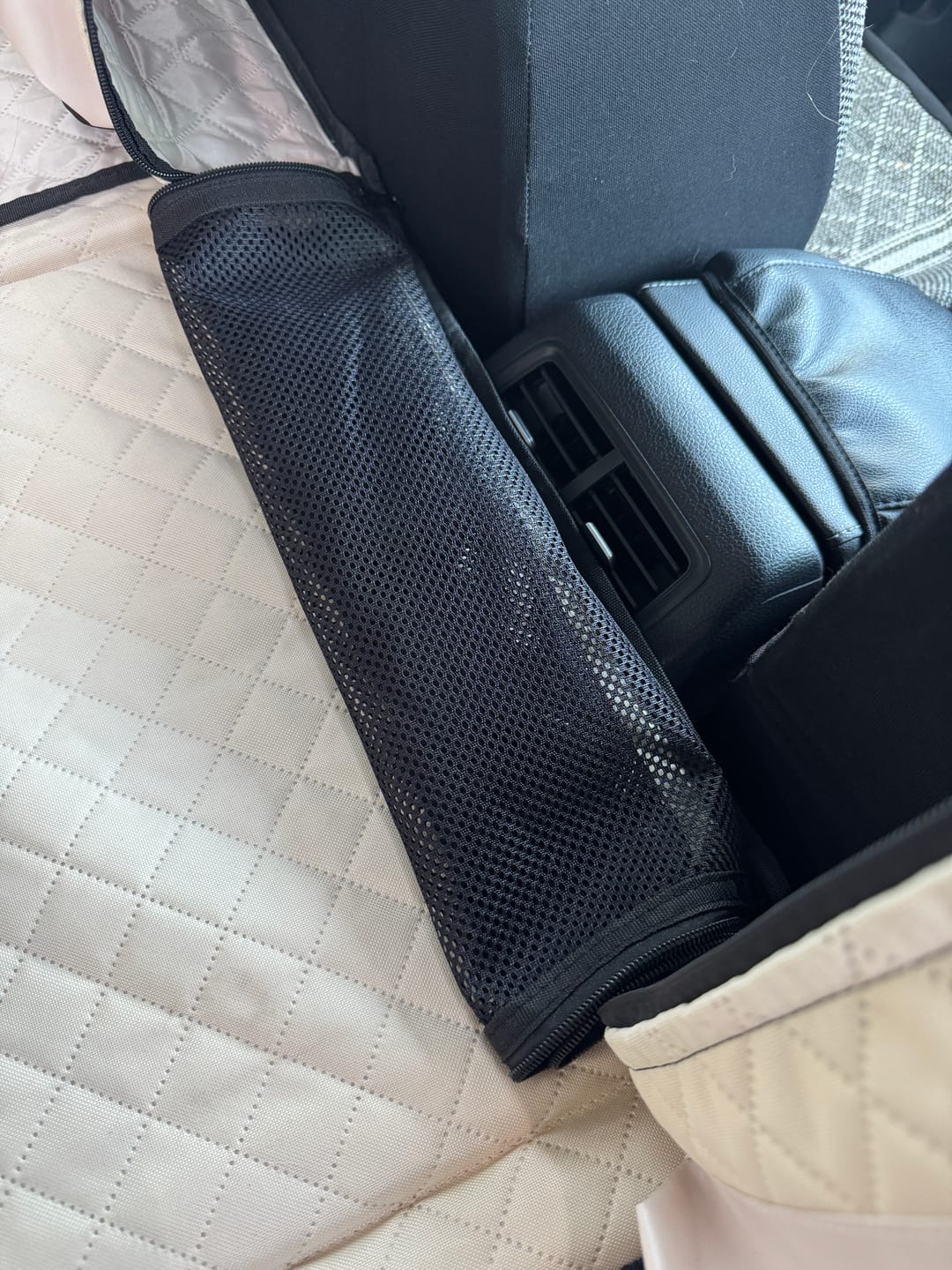 Customer photo review of NEW Waterproof Hard Bottom Car & Truck Seat Foldable Hammock Cover With Storage Pockets, Side Flaps, Headrest Straps, Seat Anchors, & Mesh Window (+FREE SAFETY BELT!)