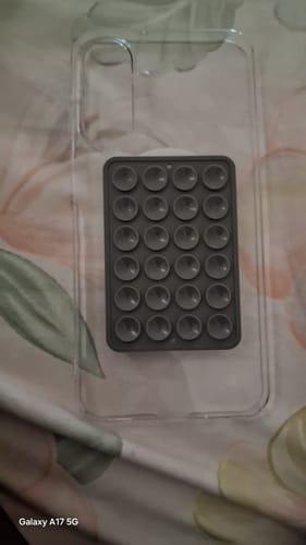 Customer's clear phone case shown in a review for the UltraShield Tempered Glass.