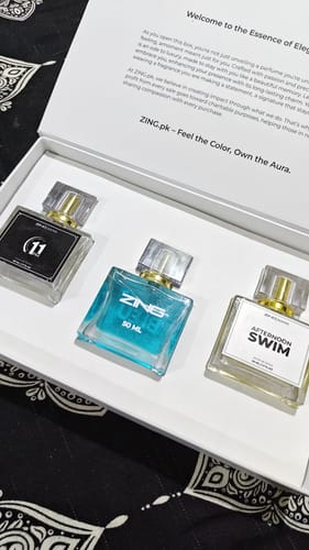 Customer's photo of the OUD Supreme BUNDLE showing three different perfume bottles in their white presentation box.