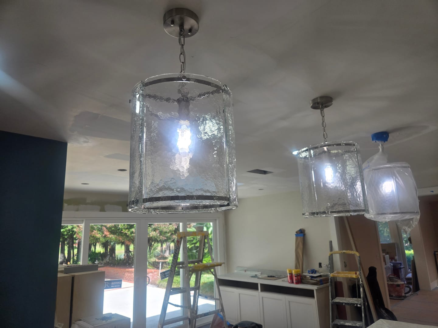 Customer photo review of Modern 1-Light Water Rippled Glass Cylinder Single Pendant