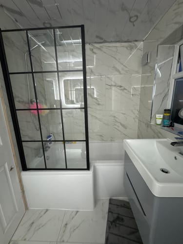 Customer photo review of L-Shaped 1700 x 850/700 Shower Bath C/W Black Framed Bath Screen & Front Panel