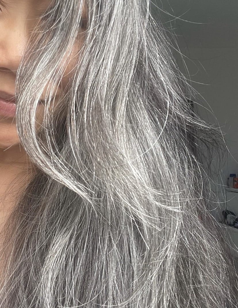 Customer photo review of Luvwin Kinky Straight Wavy Layered Style Gray Color Salt And Pepper Hair 5x5 Closure Wig