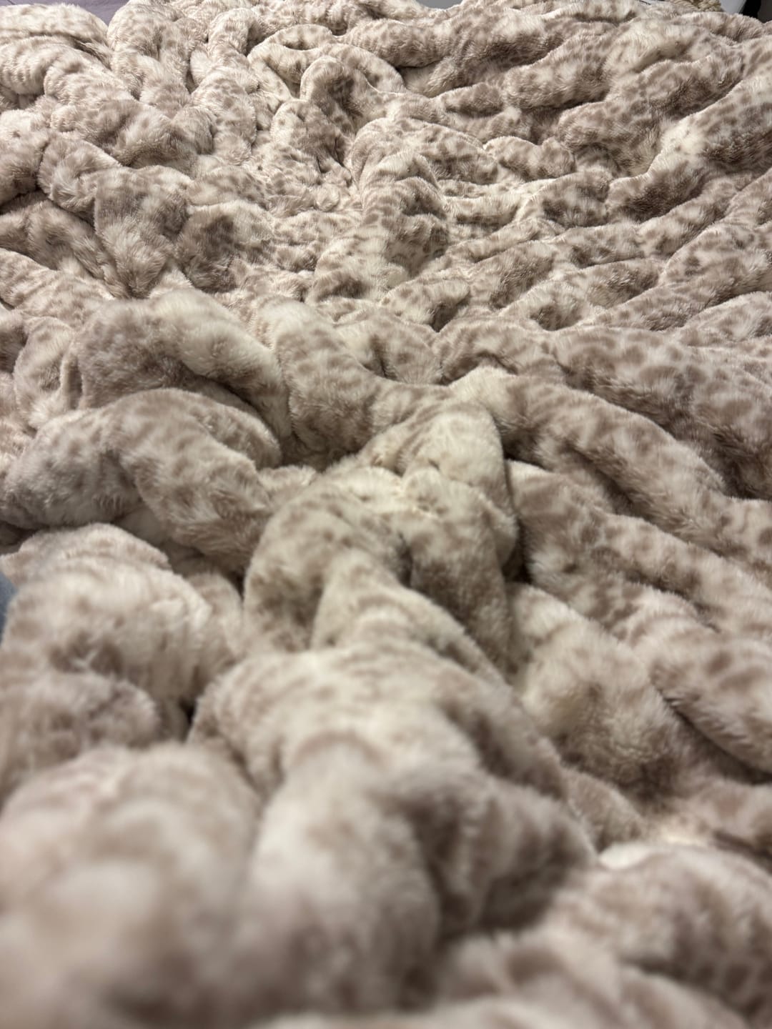 Customer photo review of Snow Leopard Minky Blanket