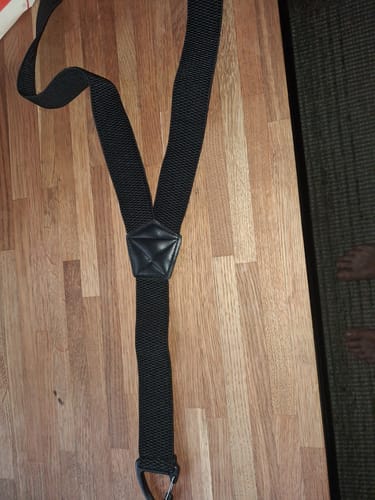Customer's photo of the black Y-back suspenders they received instead of the ordered X-back style.