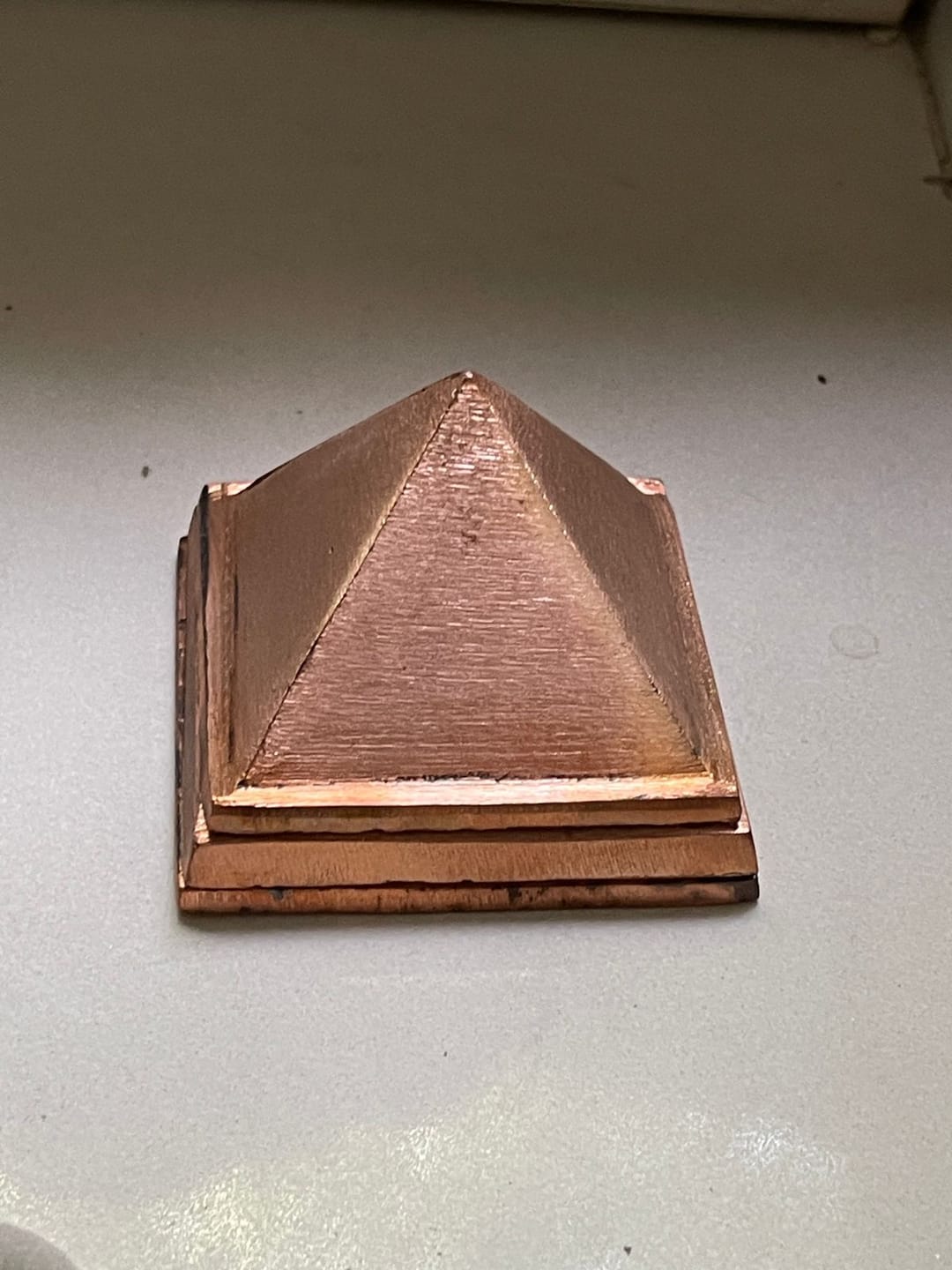 Customer photo review of 3-Layer Copper Pyramid Vastu Remedy for Energy Amplification, Prosperity and South East Direction Activation for Home, Office and Vastu Correction | 5-7.6 cm | 665 g