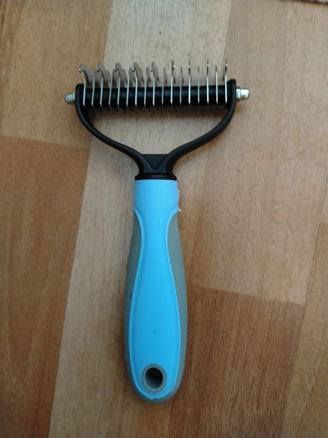 Customer photo review of FurFlow Dog Deshedding Undercoat Rake Brush | Ultimate Dog Grooming Tool