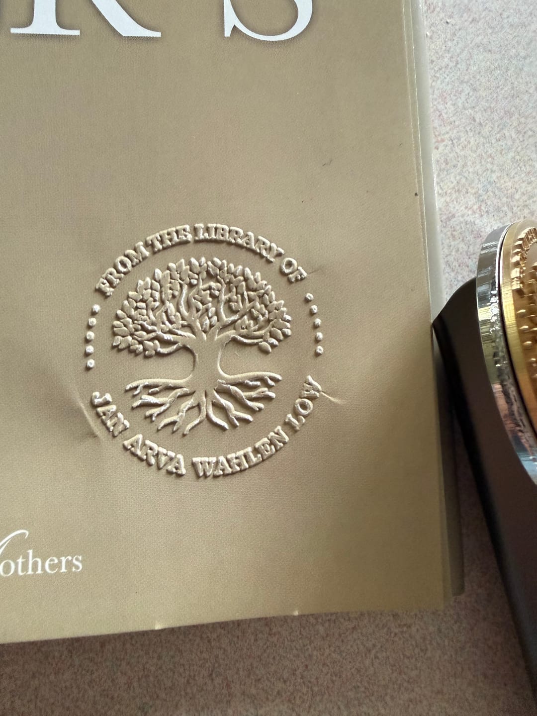 Customer photo review of My Book Embosser – Custom Book Embosser