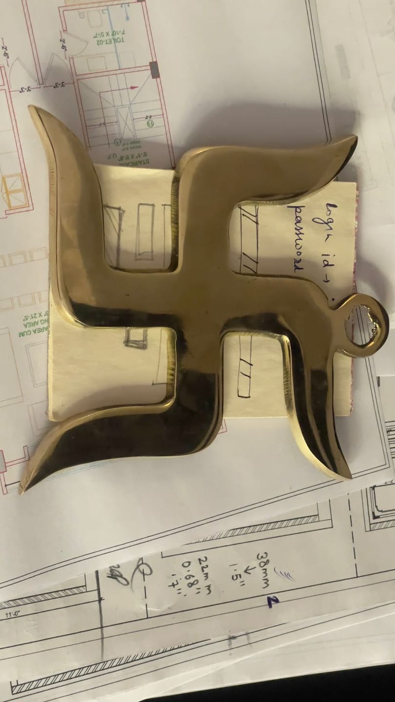Customer photo review of Brass Swastik – Vastu Remedy for Home Protection | Main Door Dosh Nivaran | 6 & 9 Inch