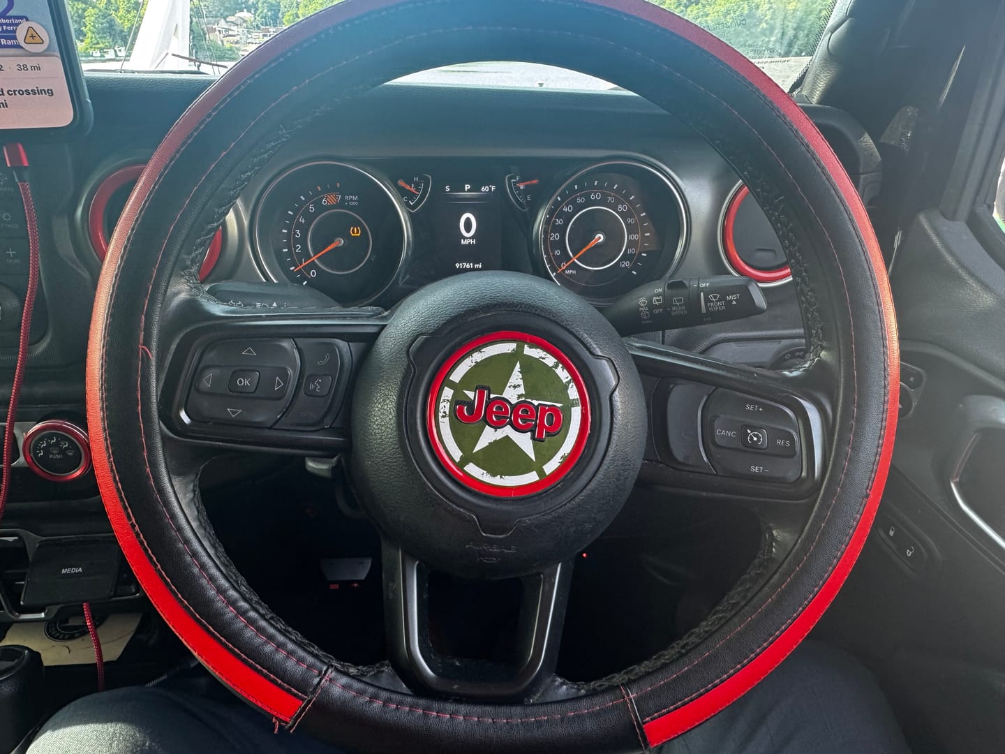 Customer photo review of JEEP Steering Wheel Emblem Overlay Decal — 30+ Colors & Designs (Flag, Topo, Animal, Solid)
