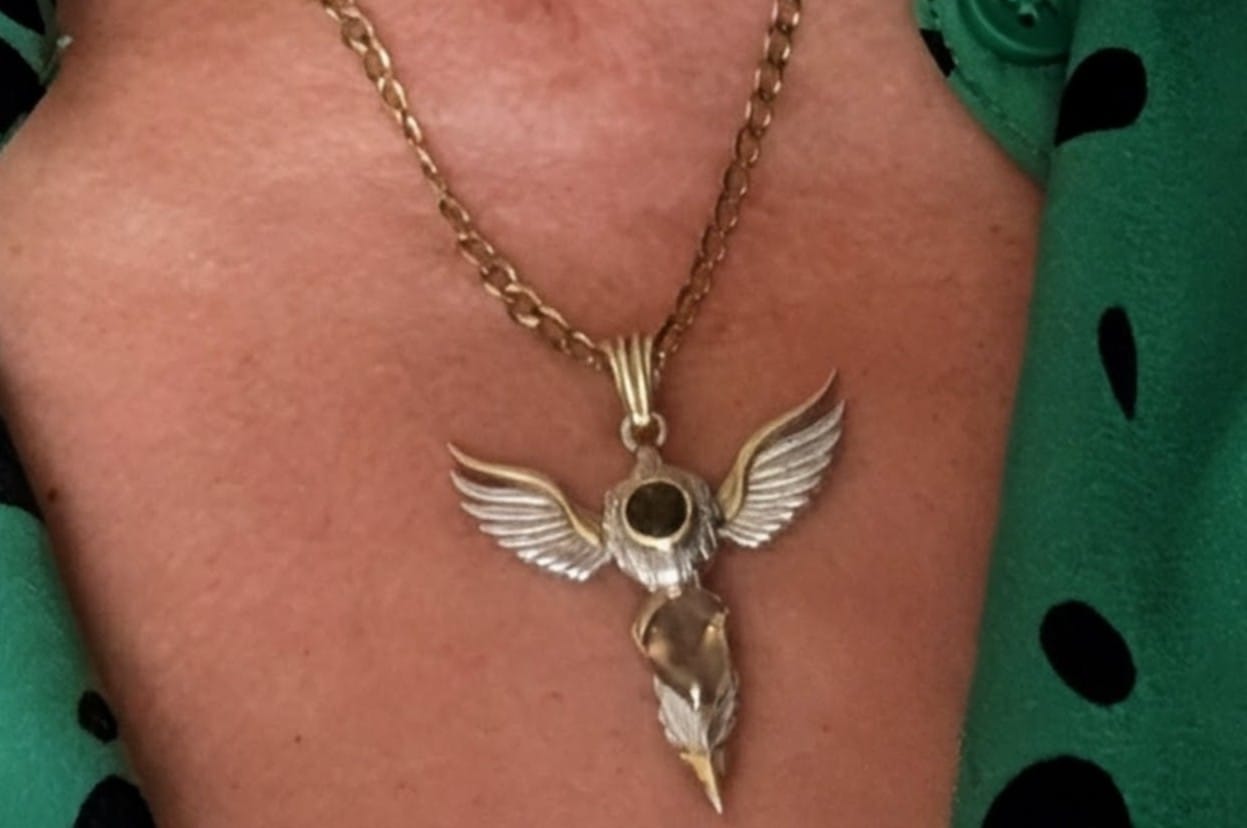 Customer photo review of Moldavite & Gold Tektite Wings of Awakening