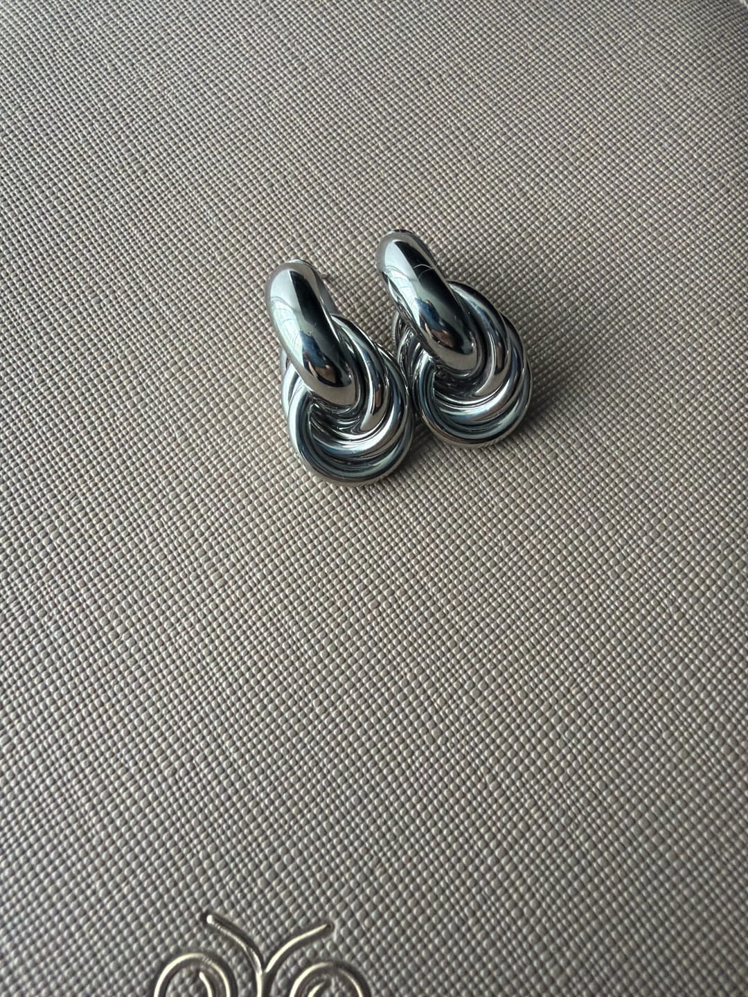 Customer photo review of Sofia Twisted Silver Hoop Earrings