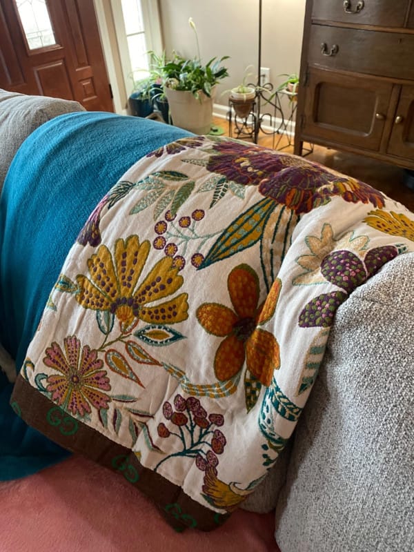 Customer photo review of Boho Floral Cotton Throw – Fringed Tapestry Blanket