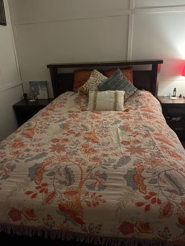 Customer photo review of Boho Floral Cotton Throw – Fringed Tapestry Blanket