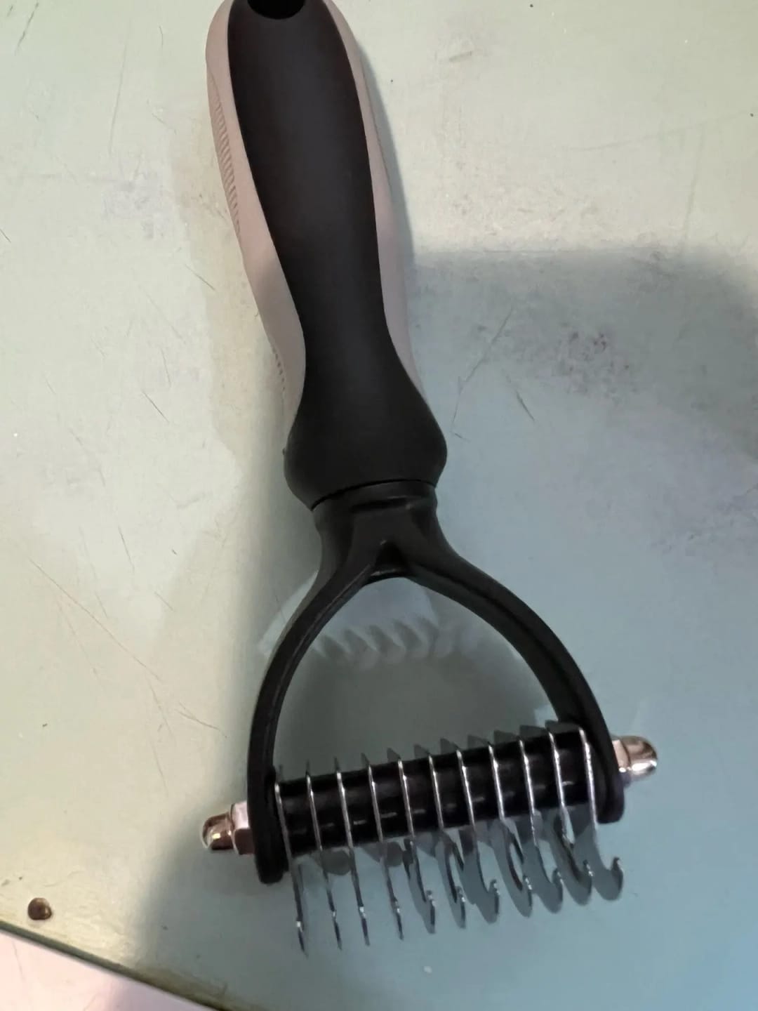 Customer photo review of FurFlow Dog Deshedding Undercoat Rake Brush | Ultimate Dog Grooming Tool
