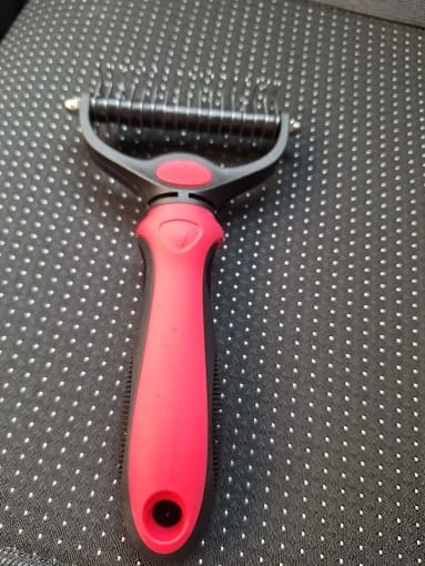 Customer photo review of FurFlow Dog Deshedding Undercoat Rake Brush | Ultimate Dog Grooming Tool