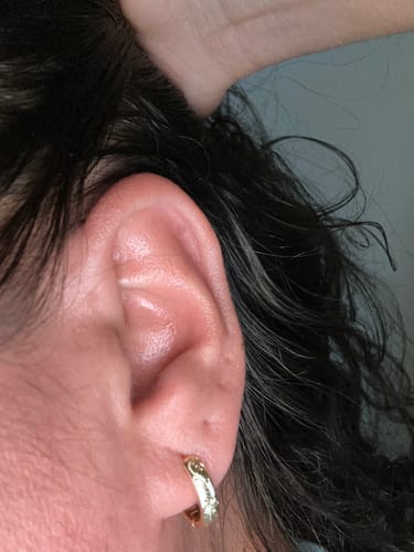 Customer photo review of S925 Plumeria Tropical Hawaiian Flower Hoop Earrings in 14K Gold - 15mm