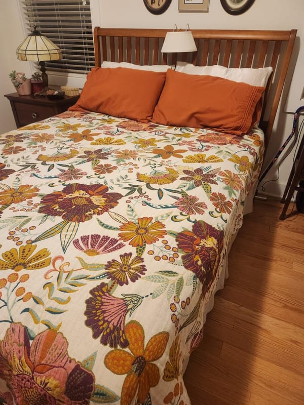 Customer photo review of Boho Floral Cotton Throw – Fringed Tapestry Blanket