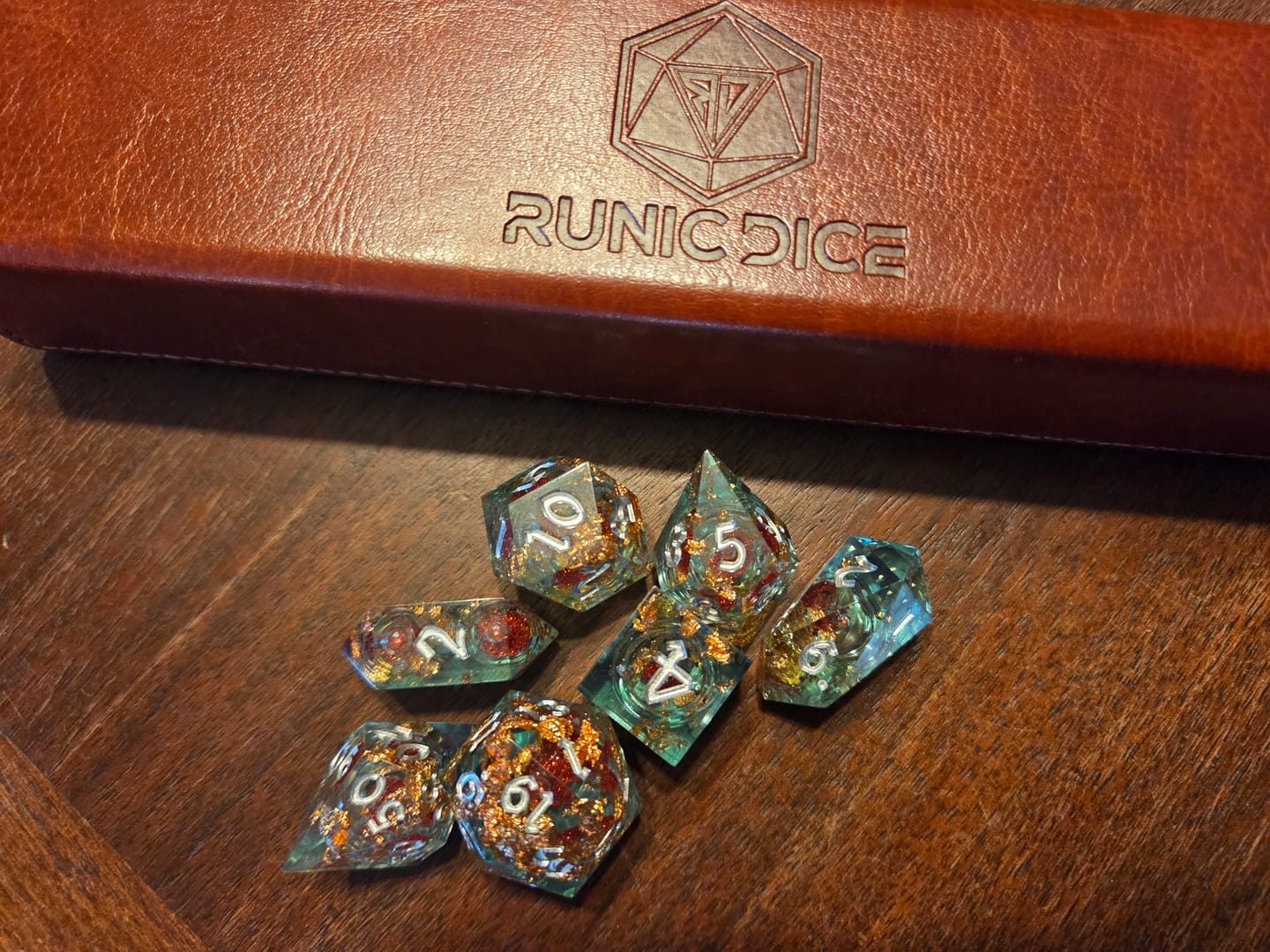 Customer photo review of Red And Gold Glitter Liquid Core Handmade Resin DND Dice Set