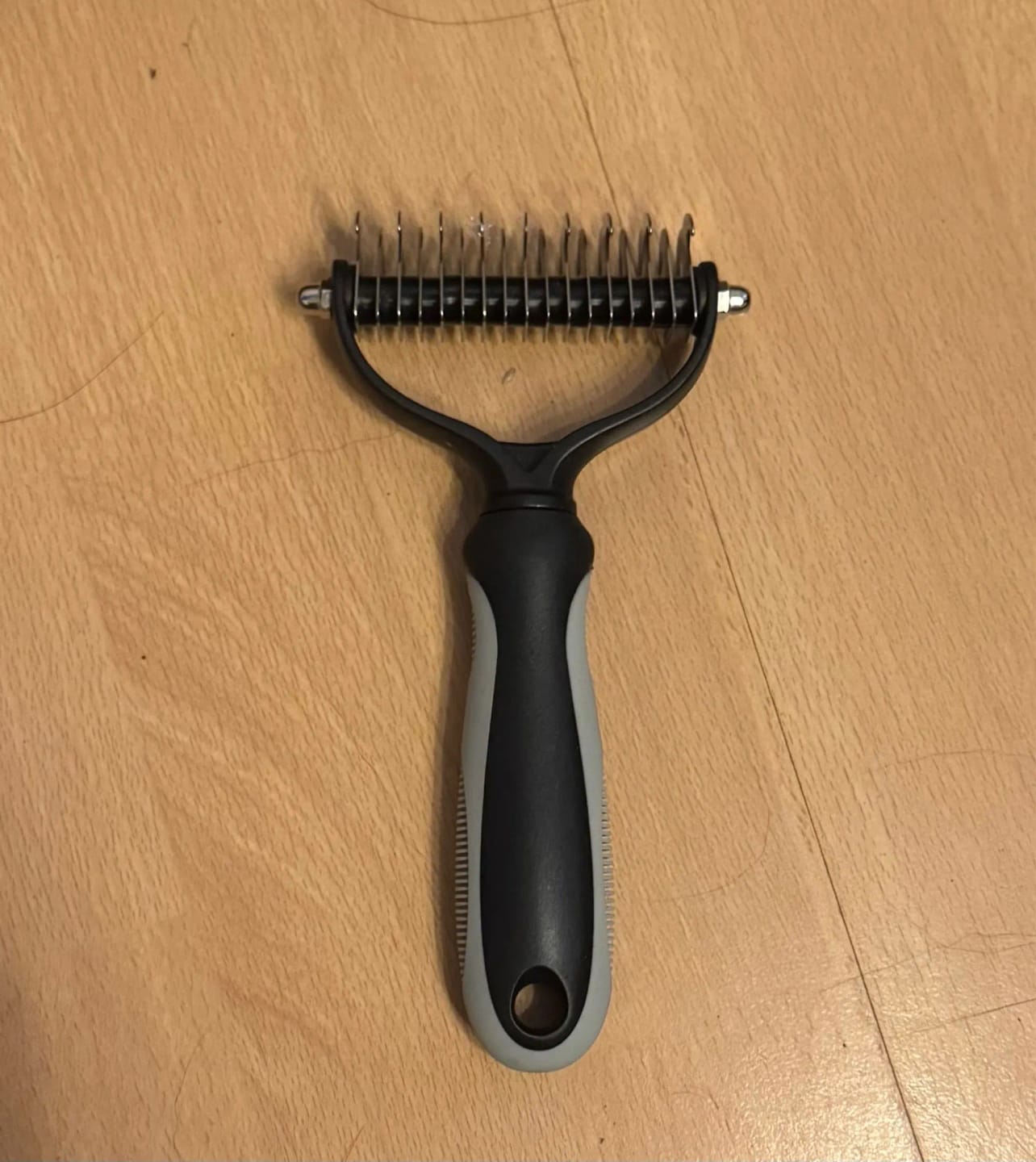 Customer photo review of FurFlow Dog Deshedding Undercoat Rake Brush | Ultimate Dog Grooming Tool