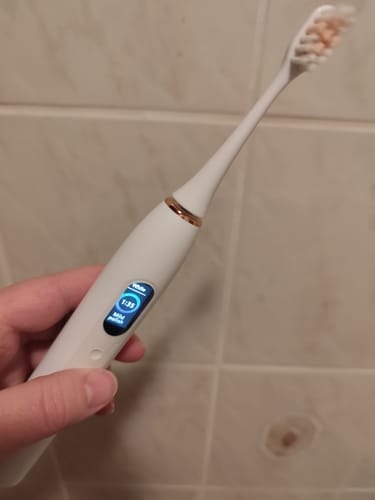 Customer photo review of Oryzom ProSonic V1 – Nettoyage dentaire professionnel avec technologie sonique pour des dents plus lisses et une hygiène bucco-dentaire optimale