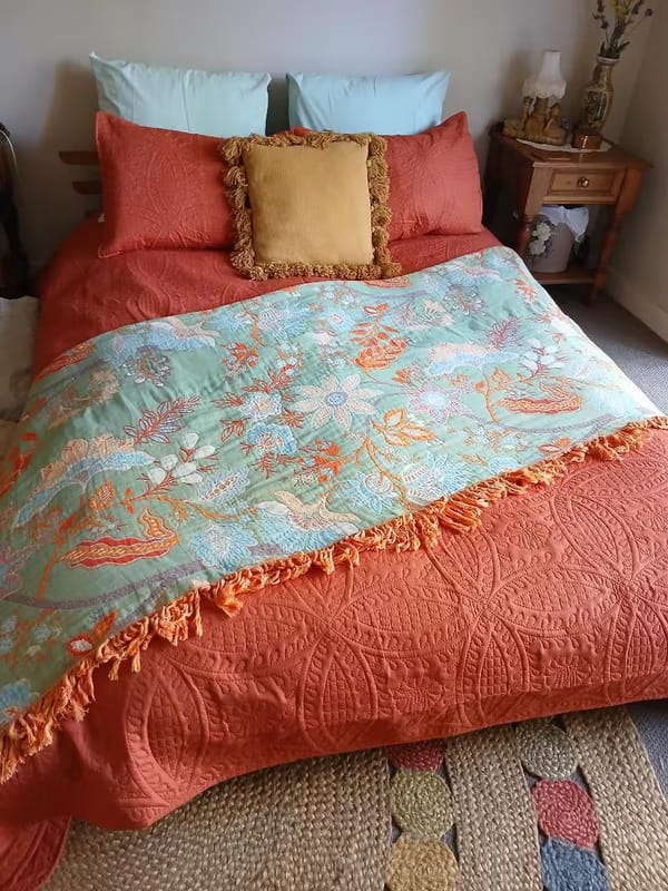 Customer photo review of Boho Floral Cotton Throw – Fringed Tapestry Blanket