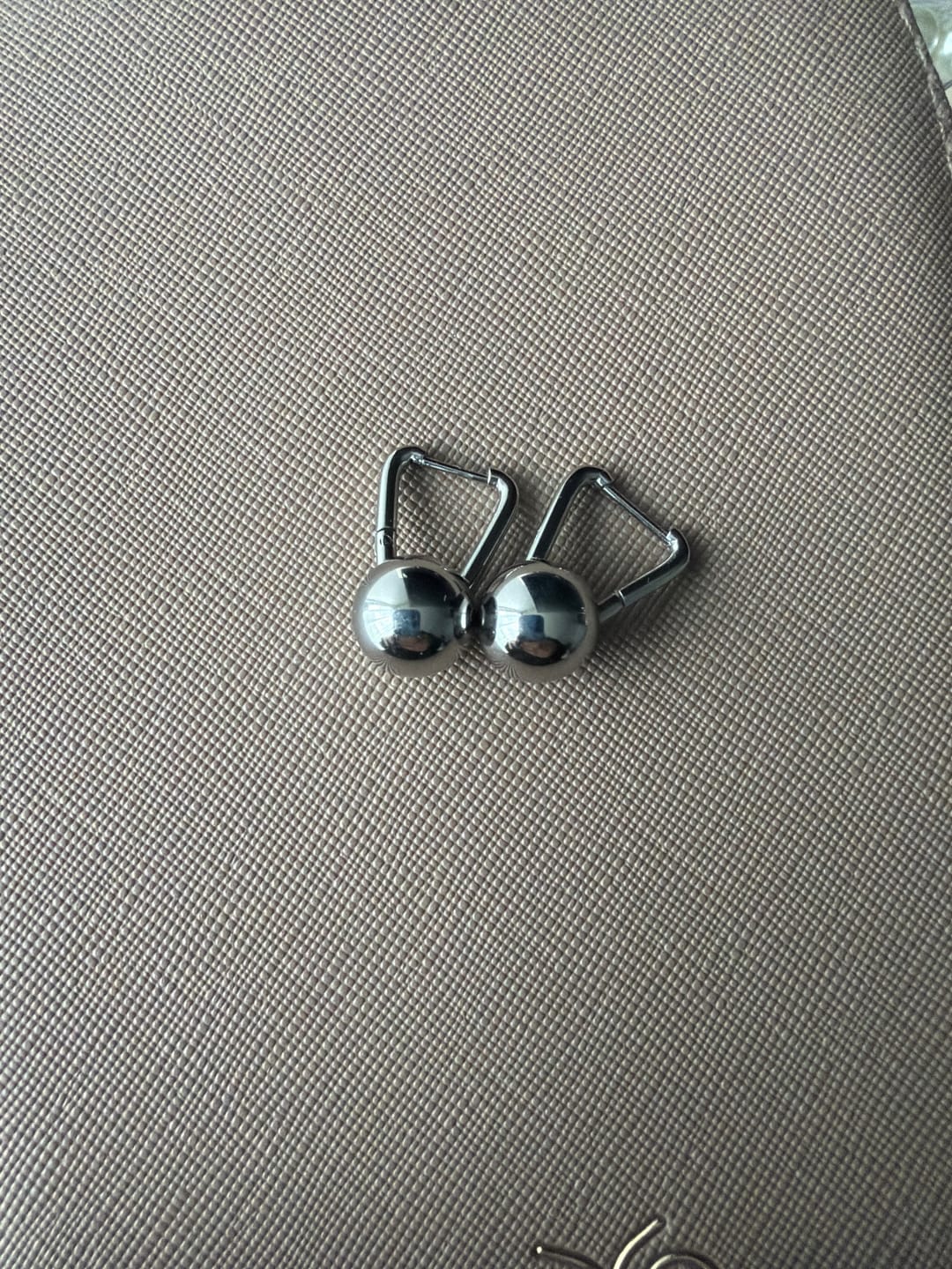 Customer photo review of Silver Dumbbell Hoop Earrings