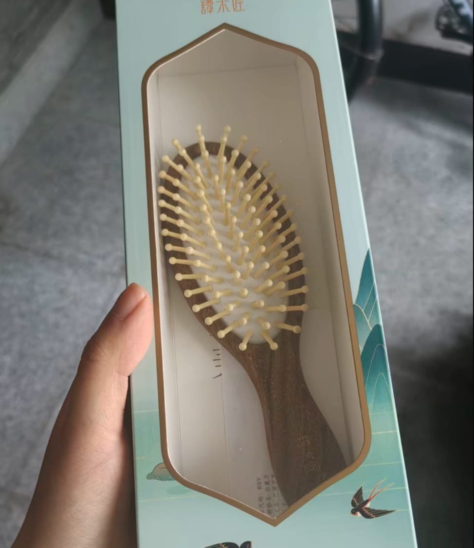 Customer photo review of Orange Cat Hair Brush