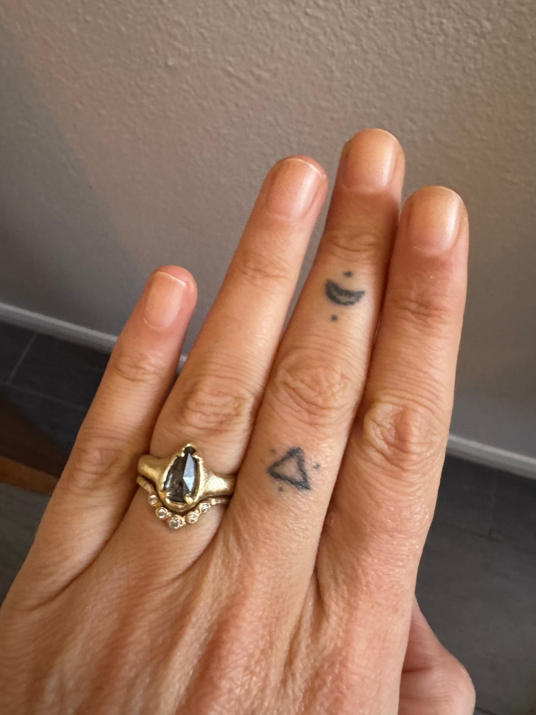 Customer photo review of 1.35 Carat Salt and Pepper Pear Diamond Ring, Hand Carved Boulder Setting