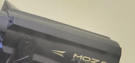 Close-up of the reviewer's black Moza active brake pedal mentioned in the review.