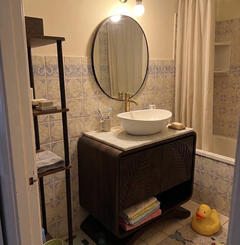 Customer photo review of Handcrafted Solid Wood Vanity Cabinet with Carved Doors