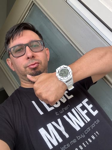 Customer giving a thumbs-up while wearing the white 80Eighty + Rockwell SnowColiseum Watch.