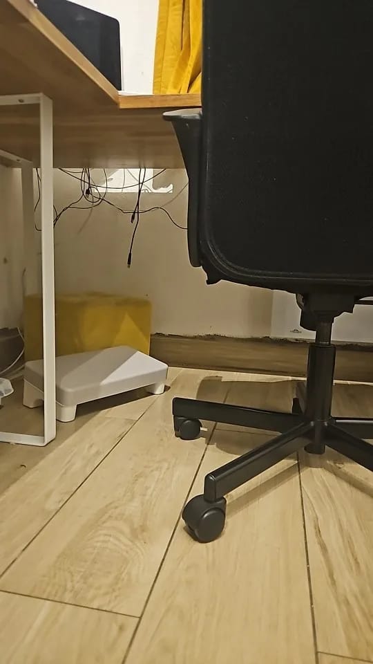 Customer photo review of Ergonomic PP Footrest for Office Desk. Fits Under Desk, Use at Work, Sofa & Study. Comfortable & Space-Saving.
