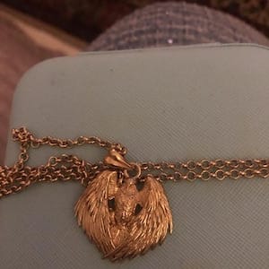 Customer photo review of Eagle Wings Pendant
