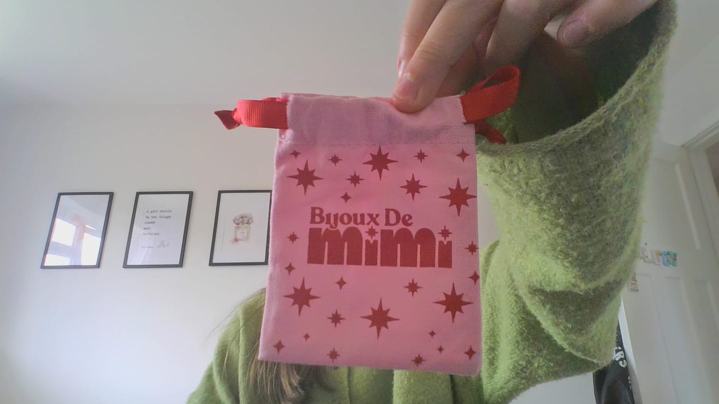 Customer photo review of Cosima Star Huggie Earrings