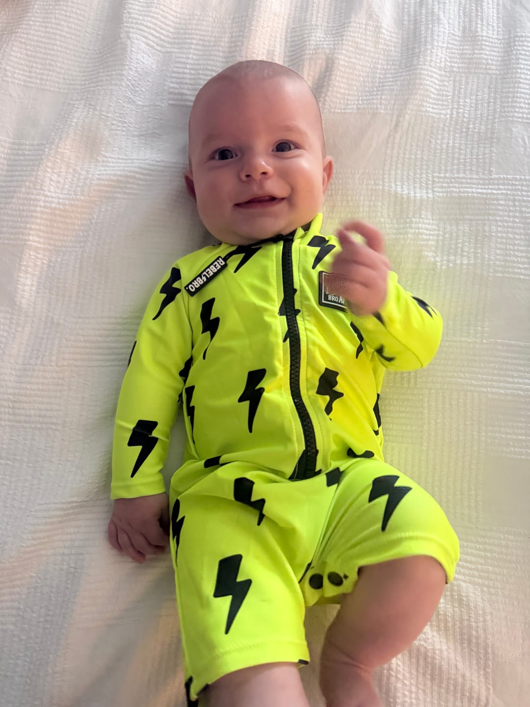 Customer photo review of UPF50+ Boys Swim Romper in Neon Electric Lime x Jagger