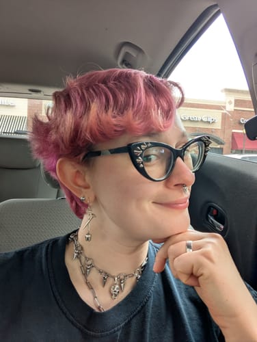 Customer photo review of Tooth&Nail Earrings