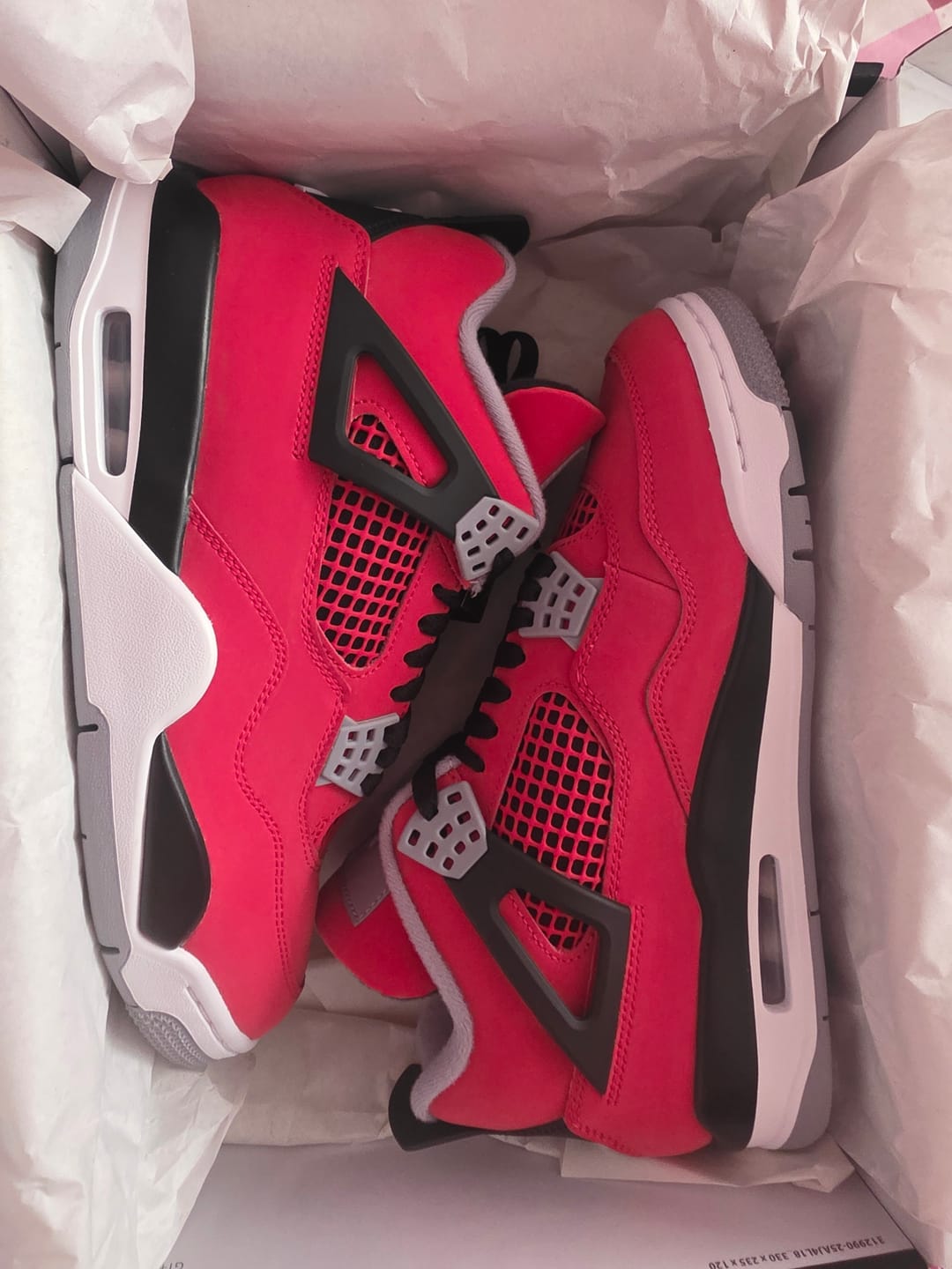 Customer photo review of Air Jordan 4 "Toro Bravo" Fire Red and Black