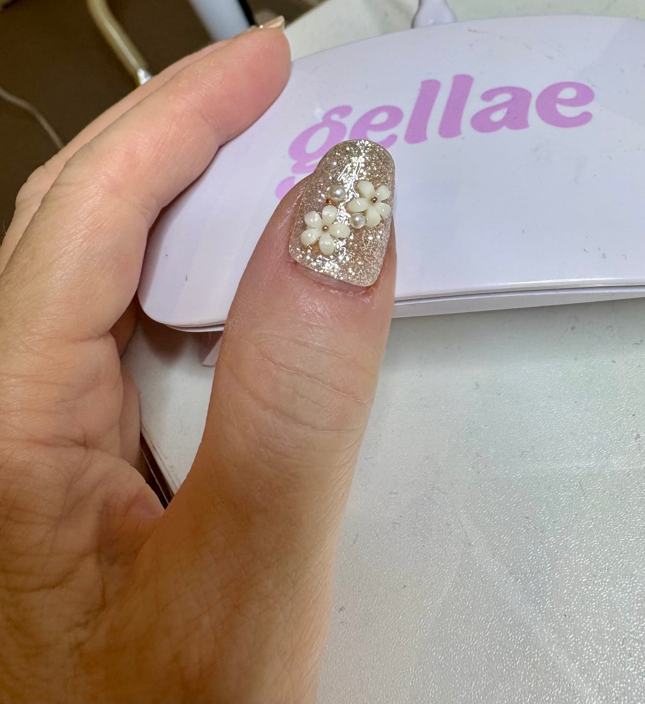 Customer photo review of Silver Stardust Shimmer DIY Semicured Gel Nail Sticker Kit