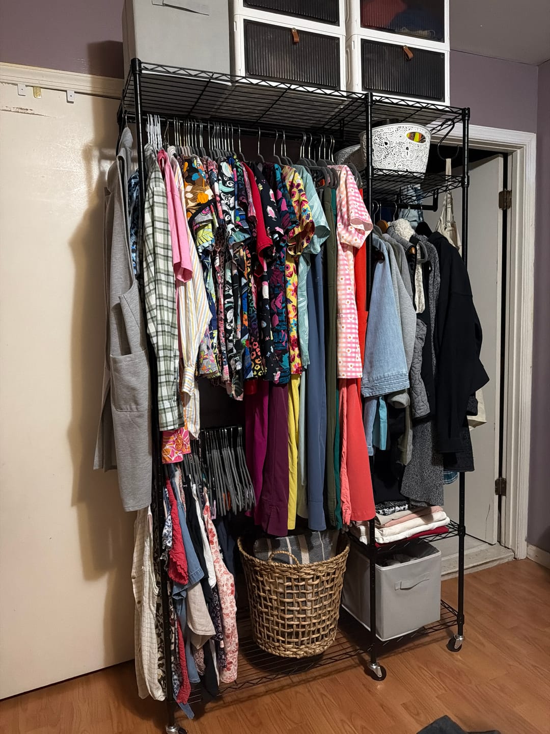 Customer photo review of Raybee Heavy Duty Portable Clothes Rack With Wheels,Clothing Rack For Hanging,Garment Rack For Bedroom