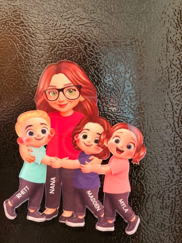 Customer's personalized acrylic magnet of a grandma and three grandkids hugging, shown on a black refrigerator.